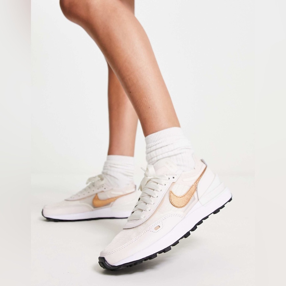 Nike Women's Sneakers in White with Metallic Rose Gold Swoosh